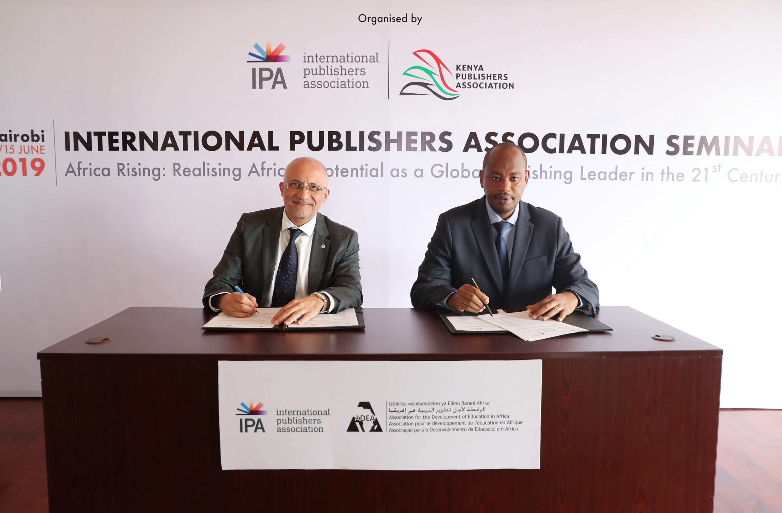 MoUs Signing IPA ADEA Hugo Setzer Albert Nsengiyumva